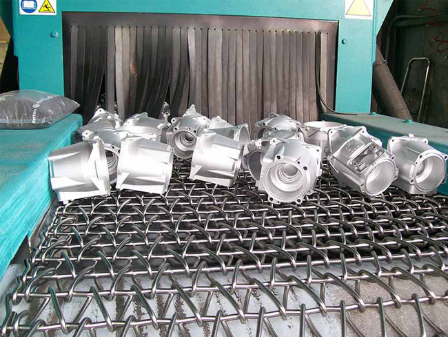 網(wǎng)帶通過(guò)式拋丸機(jī) 網(wǎng)帶通過(guò)式拋丸機(jī)